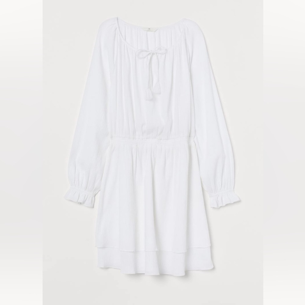 White smocked cotton long sleeve dress